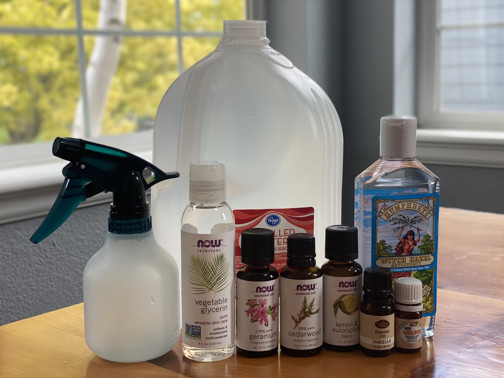 natural bug spray ingredients on a table. 