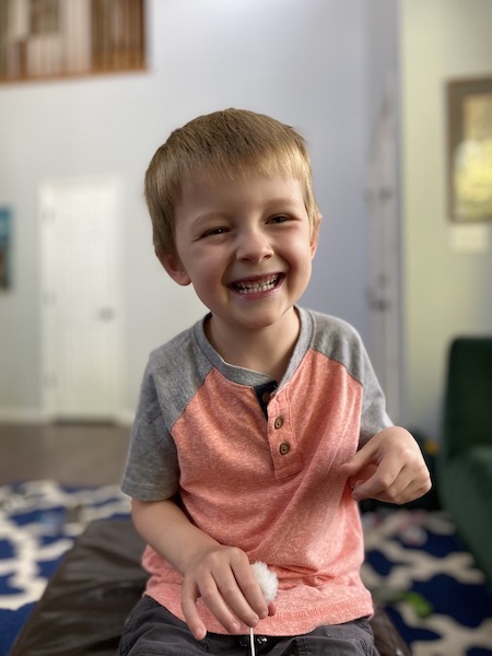 Smiling 5-year-old boy. 