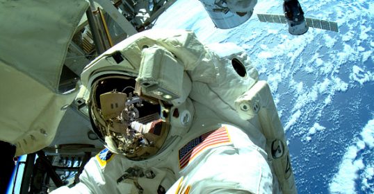 An astronaut in a space suit.