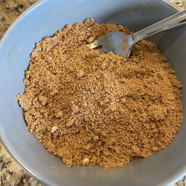 mixing brown sugar and cinnamon in a bowl for pop tart filling. 