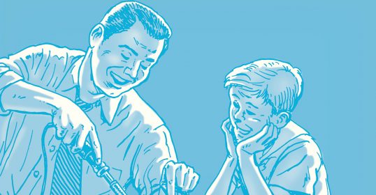 A man is guiding a beginner with a screwdriver.