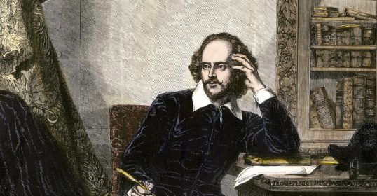 An engraving of Shakespeare at a desk, embodying the spirit of a Renaissance man.
