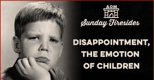 A black and white photo capturing the emotion of disappointment in a child.