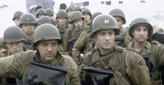 A group of men in military uniforms standing next to each other, reminiscent of classic war films.