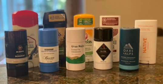 A variety of natural deodorants on a counter.