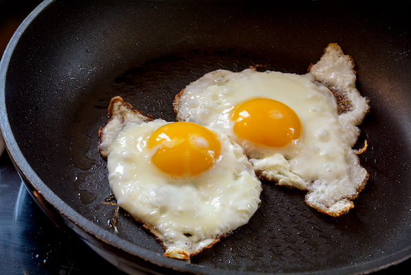 Learn how to make perfect over-hard fried eggs in a frying pan.
