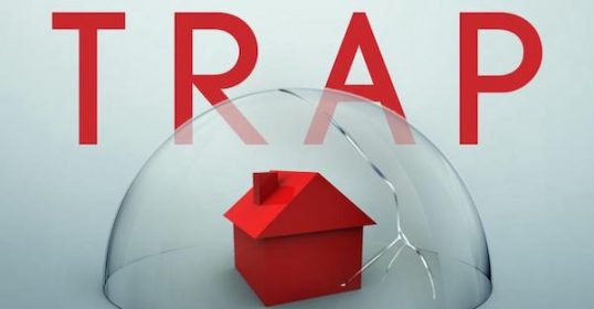 A house in a glass dome with a safety trap.