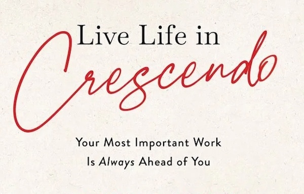 Inspirational quote on a textured background reading "Live Life in Crescendo. Your most important work is always ahead of you.