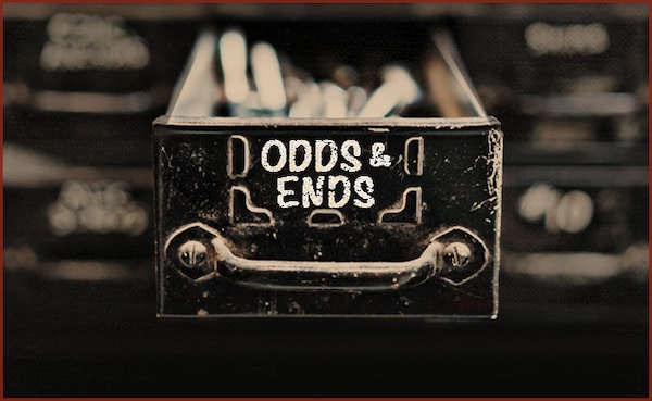 Odds and ends - a black and white image of a drawer with a sign that reads 'odds & ends'.