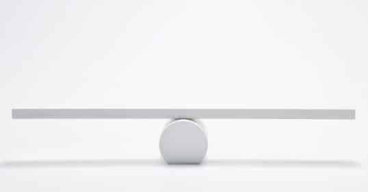 A simple balance scale with a single fulcrum on a plain background, symbolizing the concept of a dopamine reset.