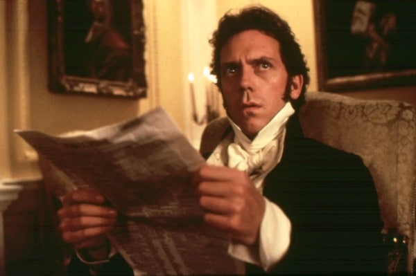 A man in historical clothing appears shocked while reading a newspaper about Podcast #871.