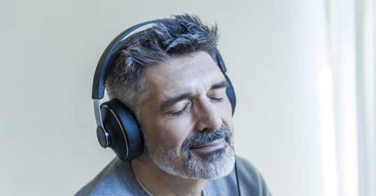 Man enjoying a podcast on