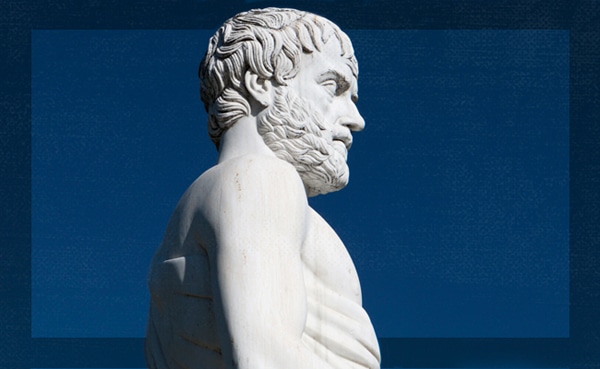 Marble statue of a living bearded male figure against a blue sky background, embodying Aristotle's Excellences.