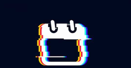 A digital icon of a calendar with a glitch effect symbolizing social discoordination on a dark background.