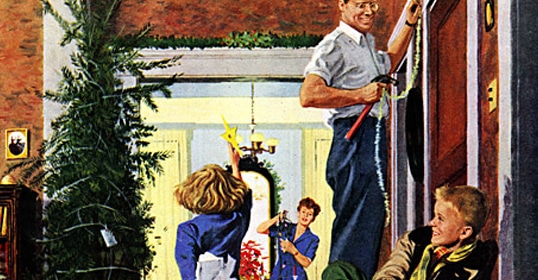 Family decorating home for the holidays; father exhibiting the art of manliness by placing star atop tree, children and mother engaged in festive preparations.