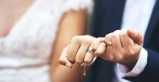 A man and woman holding hands.