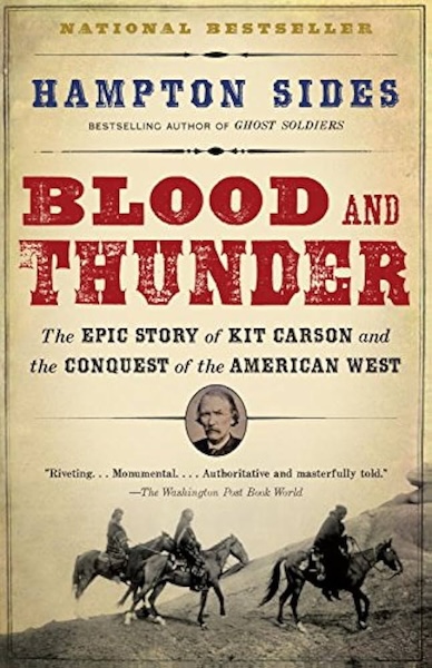 Book cover of "Blood and Thunder" by Hampton Sides, a perfect Christmas gift for history book enthusiasts. It features a vintage photo of mounted soldiers and a circular portrait of Kit Carson, along with quotes praising the captivating narrative.