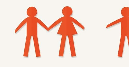 Illustration of orange paper cutouts of a person holding hands with another person wearing a dress on a plain background.