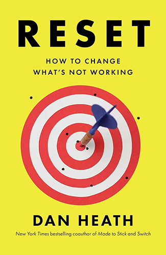 Book cover of "Reset: How to Change What's Not Working" by Dan Heath, showcasing a dart hitting the bullseye on a red and white target against a yellow background. This striking image represents finding leverage points to get unstuck in work and life.