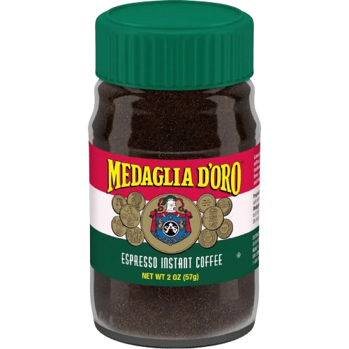 A jar of Medaglia D’Oro Instant Coffee with a green lid and a red, white, and green label, displaying the brand logo and net weight of 2 oz (57g), perfect for coffee lovers seeking the best instant coffee experience.